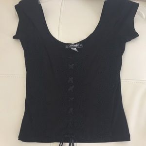 Black couture lacy top ties at the bottom